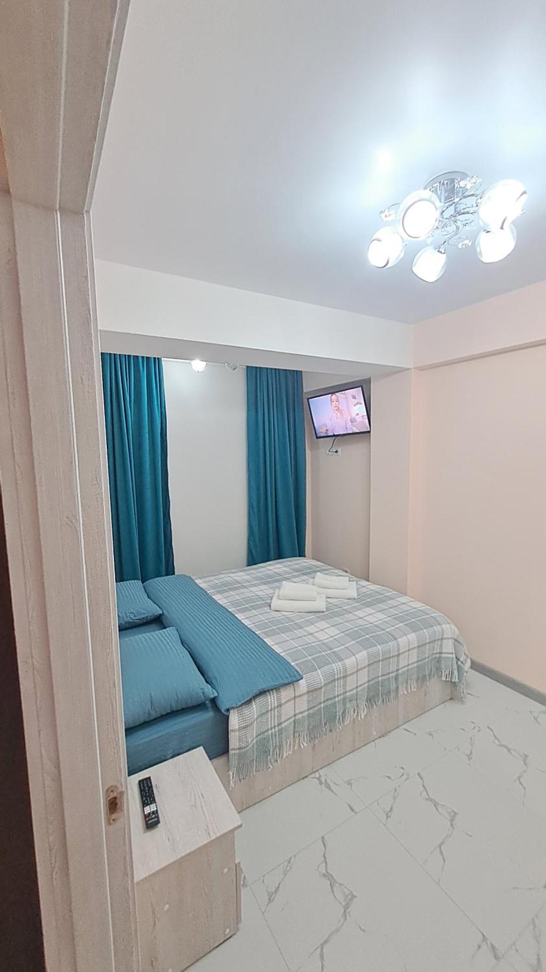 Аэропорт Апартаменты 24&24 Chişinău Habitación foto