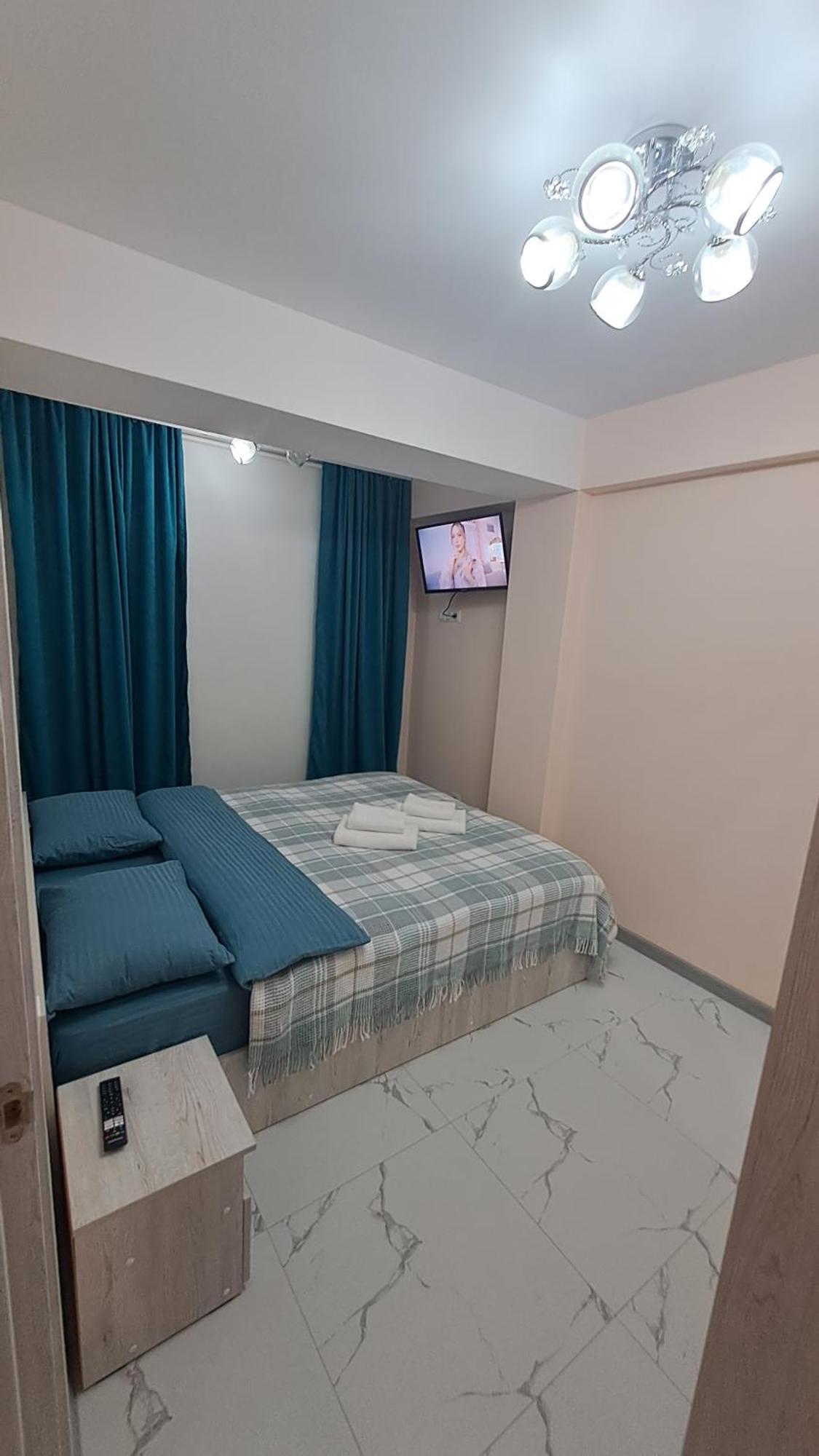 Аэропорт Апартаменты 24&24 Chişinău Habitación foto